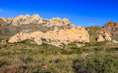 La Cueva sits below the jagged peaks of Plutonic Rocks in Organ Mountains-Desert Peaks NM