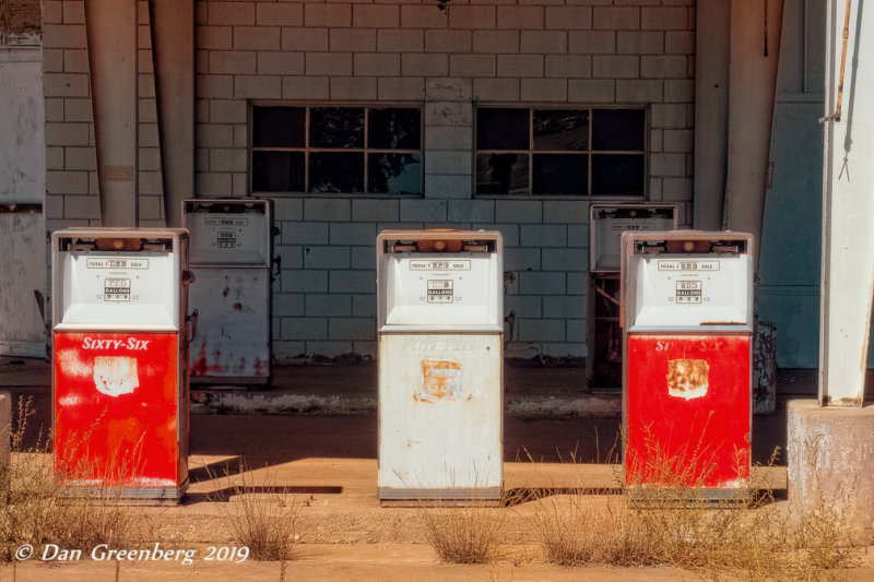 Five Old Gas Pumps