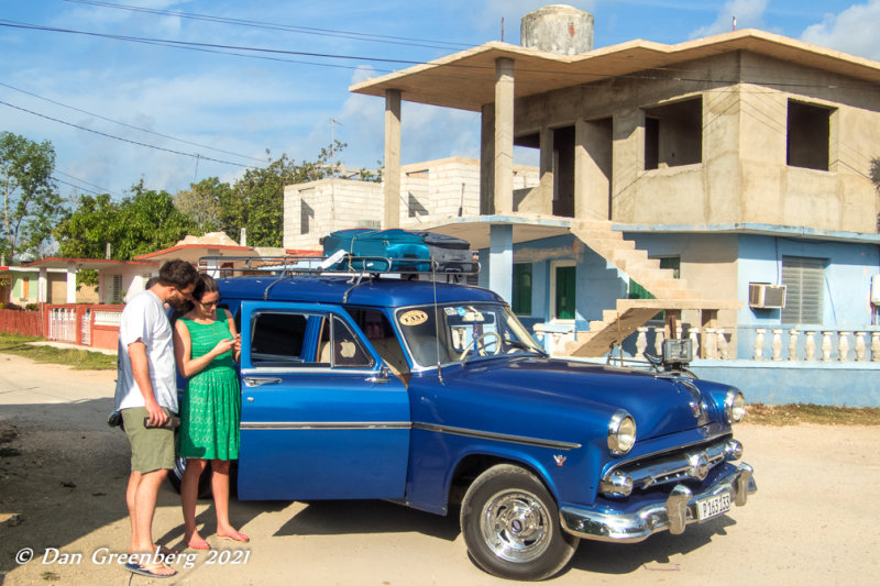 Tourists with 1954 Ford Wagon