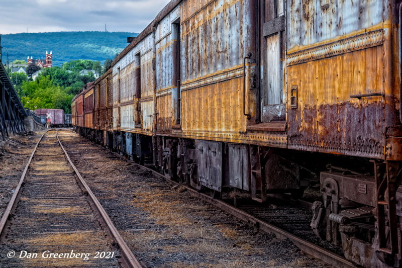 A Row of Rusty Rail Cars