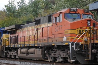 5077