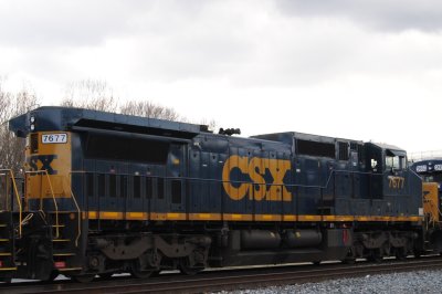 7677