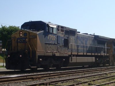 7702