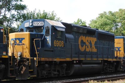 6908
