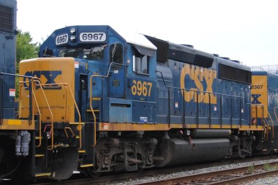 6967