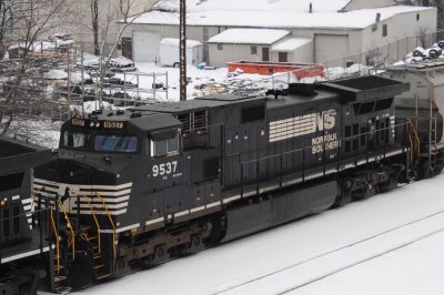 9537