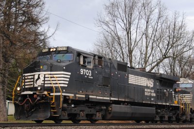 9703