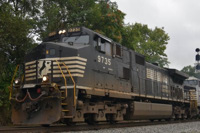 9735