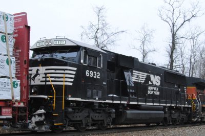 6932