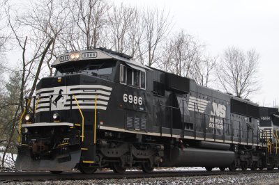 6986