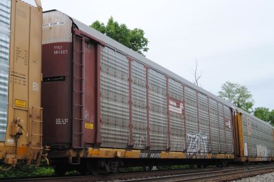 981225