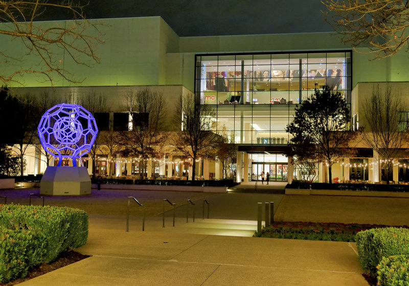 Northpark shopping centre at night time showing Leo Villareal's illuminated buckyball