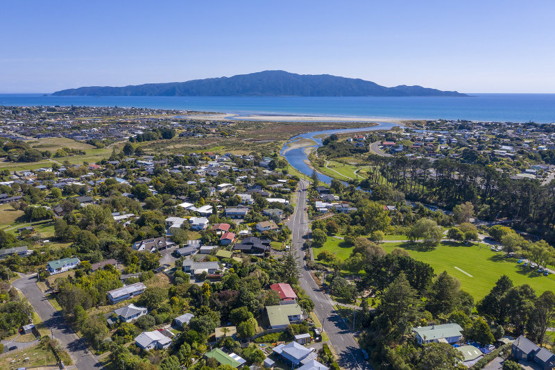 26 March 2021 - aerial shot of Kapiti Island with Otaihanga to the left and Waikanae to the right