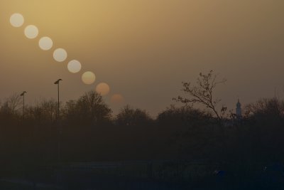 Coucher de Soleil sous le nuage de sable du Sahara