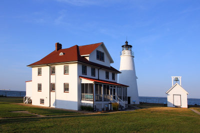 Cove Point Lighthouse with the fog bell house