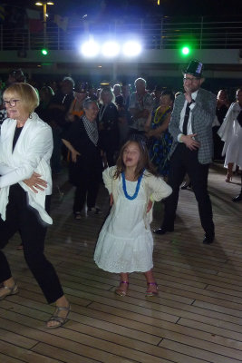 Youngest cruiser dancing with older ones & cruise director