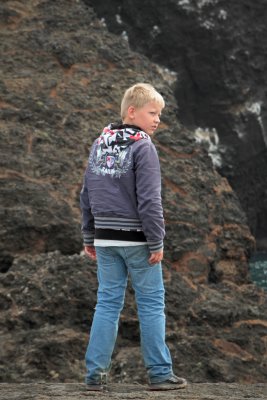 Young person near Giant Auk statue where we saw auks & other seabirds (3rd stop)