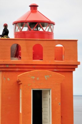 Osholar lighthouse seen on way to Bolugarvik. Was being painted or cleaned.