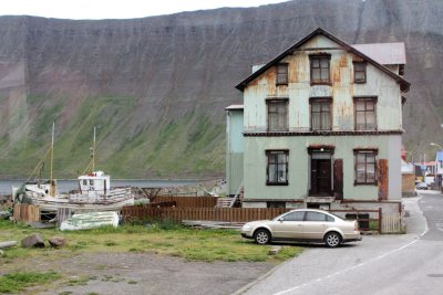 Old house & boat, new car