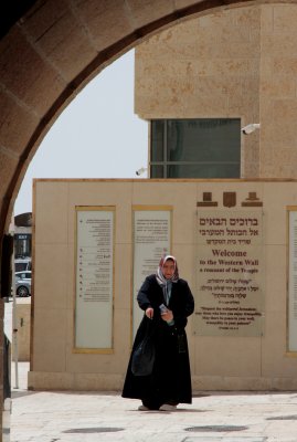 Conservative woman walking to Western Wall