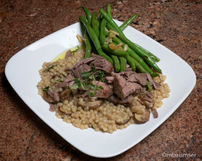 Lamb Confit with pearl couscous and green beans