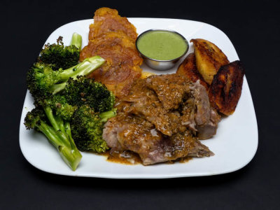 Pernil Tostones w/green sauce, Fried sweet plantains, and some roasted broccoli