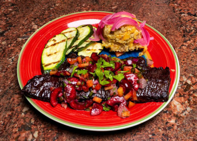 Churrasco with peach and cherry salsa, Mofongo with pickled onions, grilled zucchini