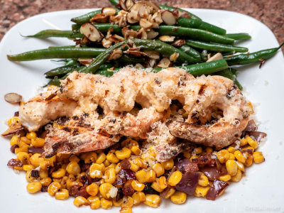 Grilled Garlic Parmesan Shrimp over Corn and Chorizo medley with Sauteed Green Beans with Almonds