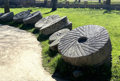 Large collection of mill grinding stones from the 1800s (many imported from Europe)