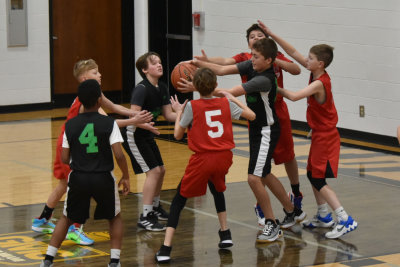 12 hands going for the ball!