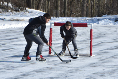 Brothers competing at the net