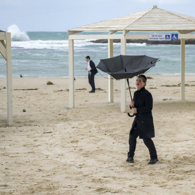 Hassidic groups stay in guest houses along Dor beach for shabbat during low-aeason