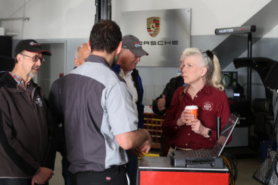 Porsche of Silver Spring technician demonstrates Porsche's computerized diagnostic system. (2710)