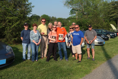 The rally master and some of the participants and checkpoint crew members of the 2019 PCA Chesapeake TSD Rally celebrate. (3536)