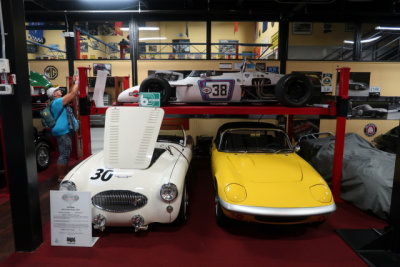 1955 Austin-Healey 100 S and 1960s Lotus Elan underneath a 1969 Brabham BT29, with 1600cc Lotus-Ford twin-cam 4. (3993)