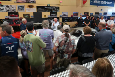 Owner of car collection speaks to visiting Porsche Club members. (3929)