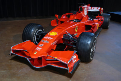 Life-size plastic replica of a Formula 1 Ferrari raced by Michael Schumacher in the 2000s. (4623)