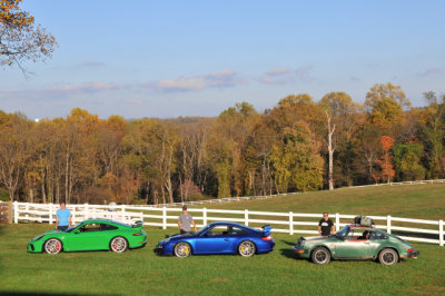 From left, 2018 Porsche 911 GT3, 2010 911 GT3, 1985 Safari 911 Carrera at Skip Conreys Valhalla Farm (8659)