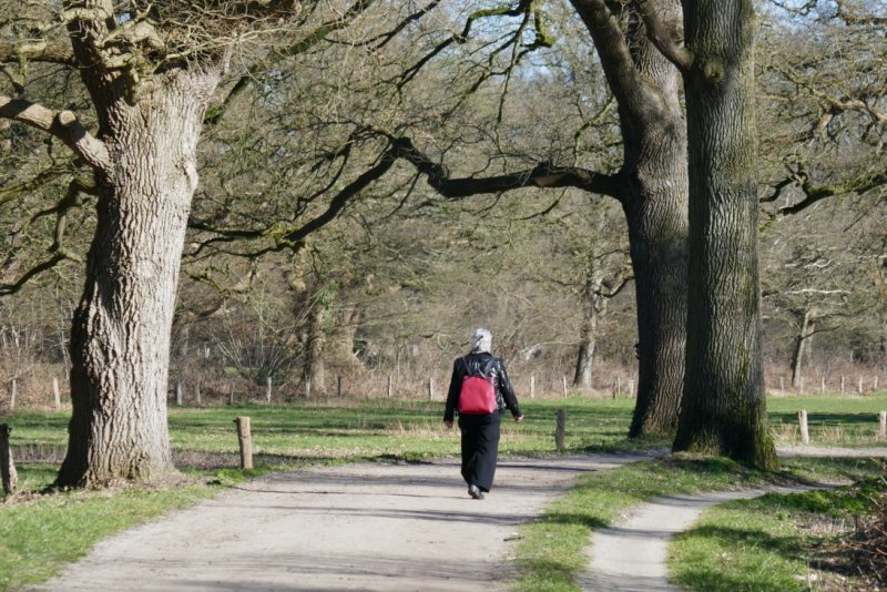 Lady with red backpack