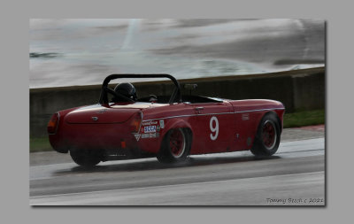 MG Midget on a wet track