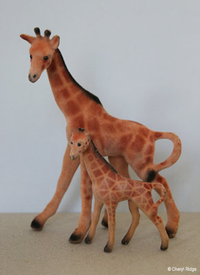 Flocked giraffe figurines