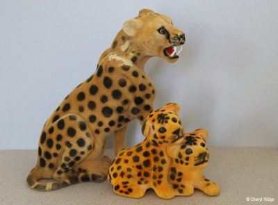 Flocked leopard figurines
