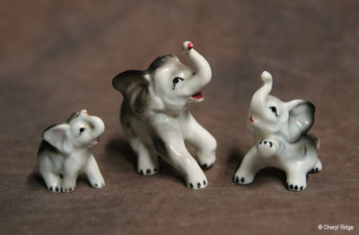Trio of bone china elephant figurines