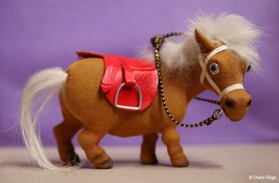 unknown flocked pony made in Hong Kong