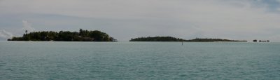 Nabuco Resort with three small island next to it and sands.jpg