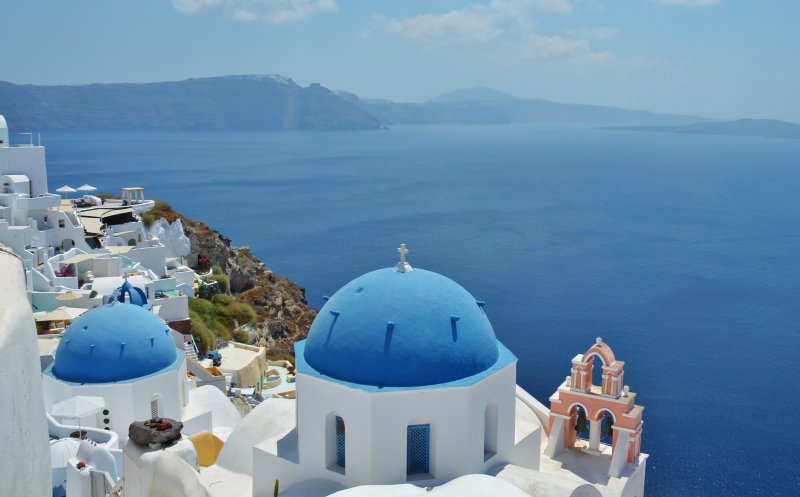 The blue domed Church of Anastasis, Oia.