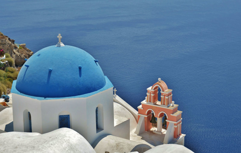 The blue domed Church of Anastasis, Oia.
