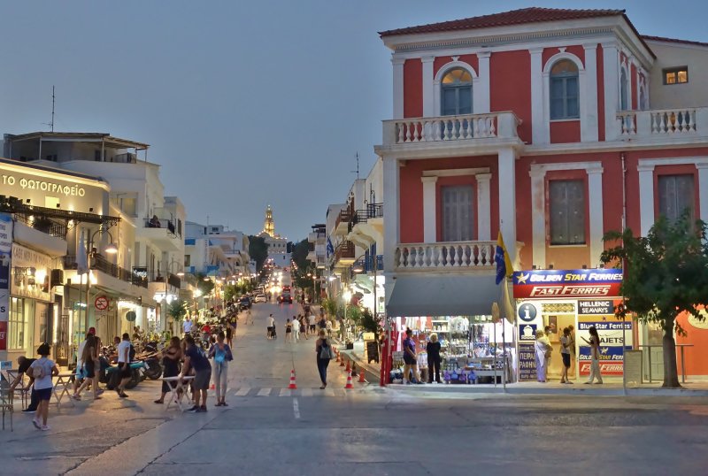 Tinos town and the church of Panagia Evangelistria at the bottom of the road