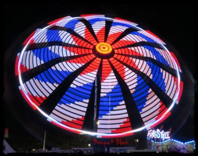 RED, WHITE AND BLUE SPINNING WHEEL
