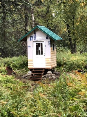 An accessible, functional outhouse!  (They finished the siding later)